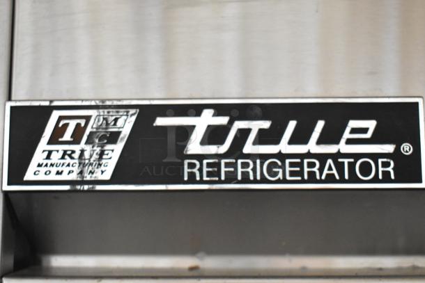2016 True T-35-HC Stainless Steel Commercial 2-Door Reach-In Cooler, poly-coated racks, showing brand logo.