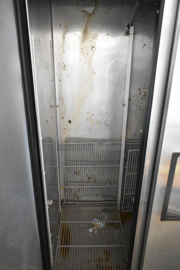 2016 True T-35-HC 2-door stainless steel cooler, poly-coated racks, visible wear, 115V, 1 phase, commercial use.