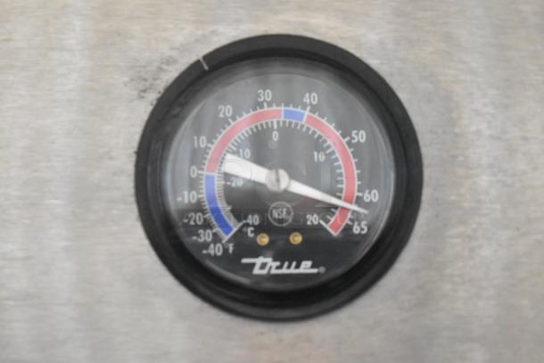 True T-35-HC cooler temperature gauge displaying range in Fahrenheit with NSF approval marking.