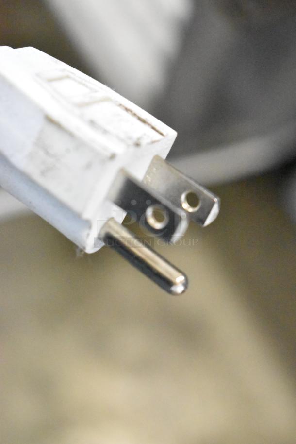 Close-up of a 115V power plug for the 2019 Accucold ARG3PV Mini Cooler Merchandiser.