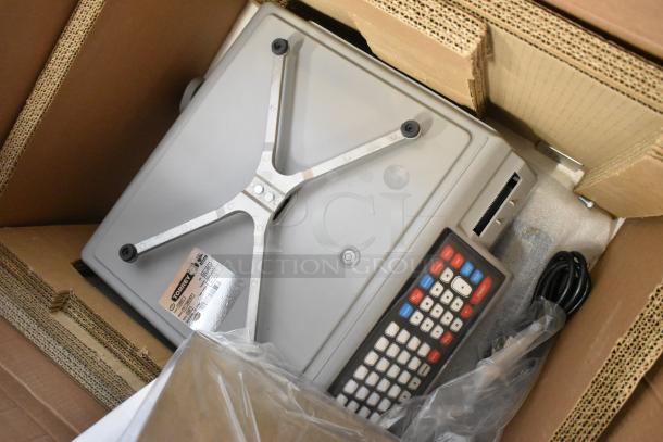 Brand new Torrey W-LABEL40LP 40 lb. WiFi price computing scale with thermal label printer in box, scratch and dent.