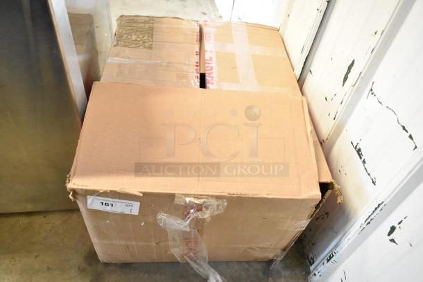 Sealed cardboard box for Torrey W-LABEL40LP 40 lb. scale with a label printer. Box shows slight damage, labeled "fragile."