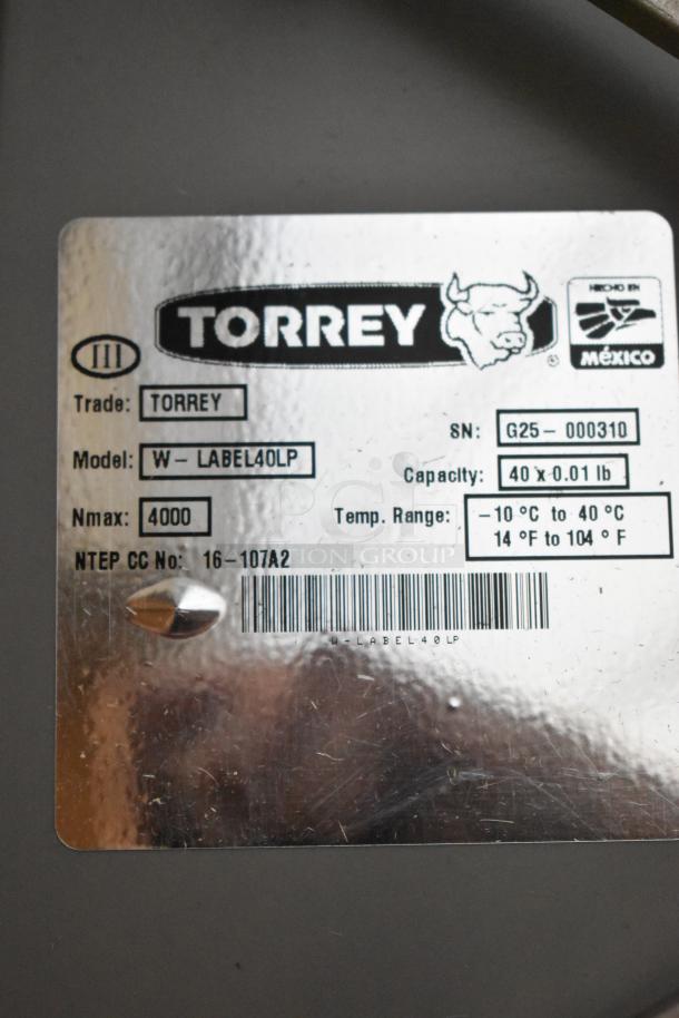 Alt text: Torrey W-LABEL40LP scale label, capacity 40 lb., model details, Nmax 4000, temp range -10°C to 40°C, serial G25-000310.