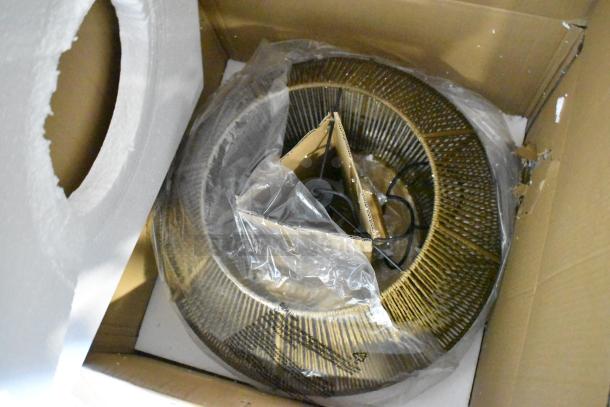 Brand new Torrey Globe pendant light, model W-LABEL40LP, in original box. Bohemian chic design, natural twine, minor dents.