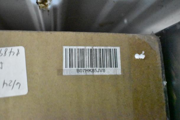 Cardboard box of Torrey Globe Bohemian Chic Natural Twine Pendant Light with a visible barcode, model W-LABEL40LP.