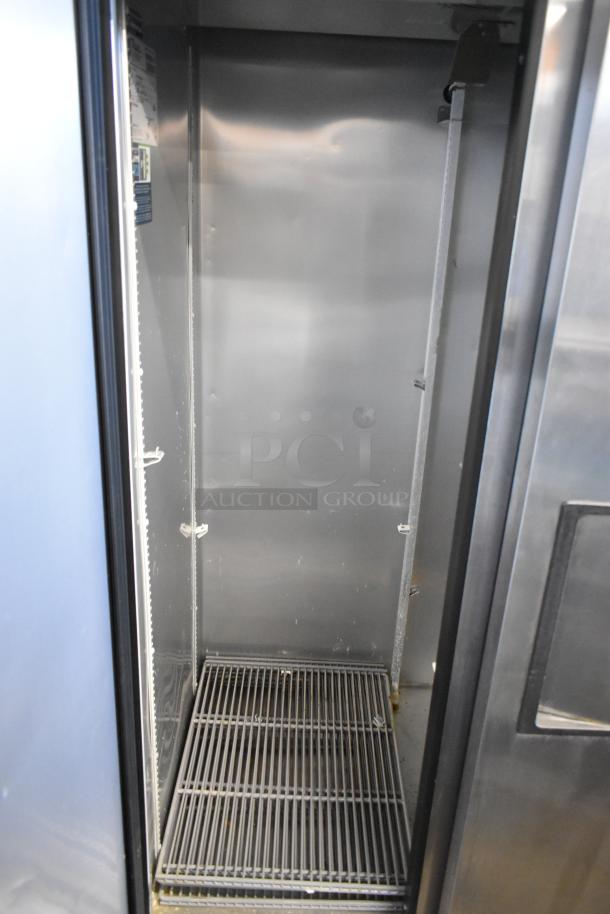 2021 True T-35-HC stainless steel 2-door reach-in cooler, poly-coated racks, 115V, 1 phase, clean interior.