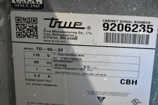 Label of 2017 True TD-65-24 commercial cooler, 115V, 1 phase, shows specifications like refrigerant type R134A, and serial number 9206235.