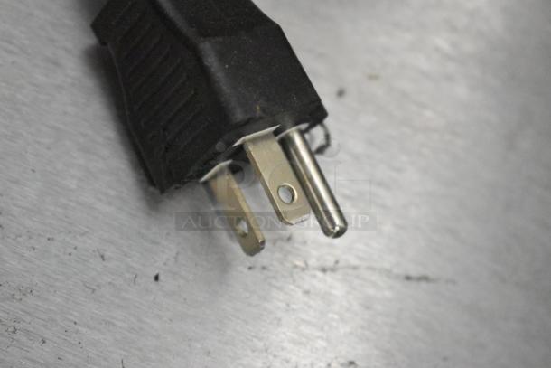 Close-up of the power plug for Avantco 177EG30N stainless steel 30" electric countertop griddle, 208/240V, 1 phase.