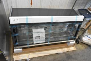 Brand new KoolMore HDC-6C metal countertop display warmer with minor scratches. Includes manual, two shelves, protective packaging.