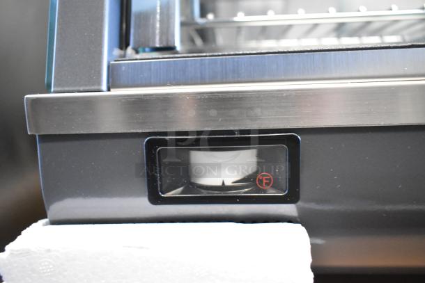 BRAND NEW SCRATCH AND DENT! KoolMore HDC-6C metal countertop display warmer with adjustable thermostat visible.