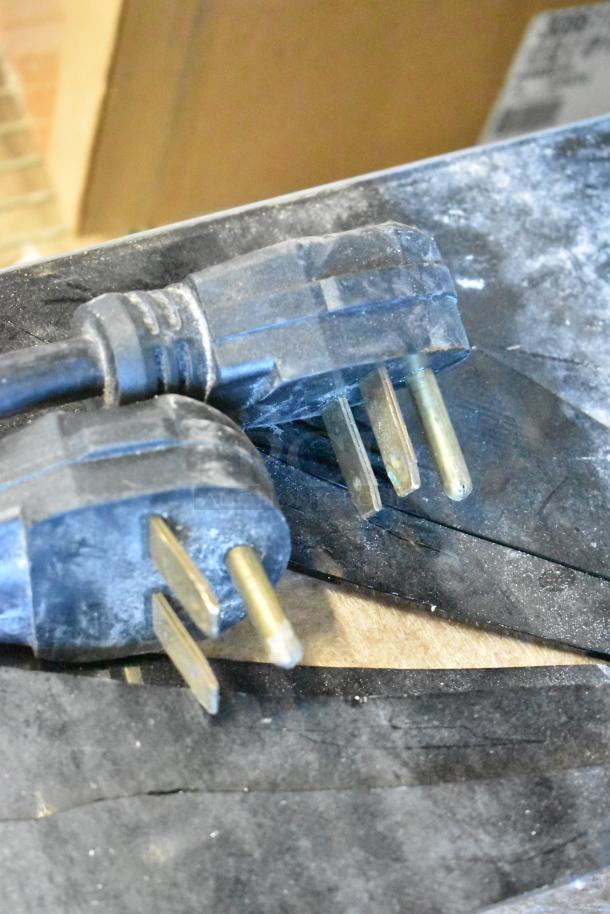 Two CookTek MC2502F induction range power plugs, one range has a broken glasstop, suitable for 200-240 volts.