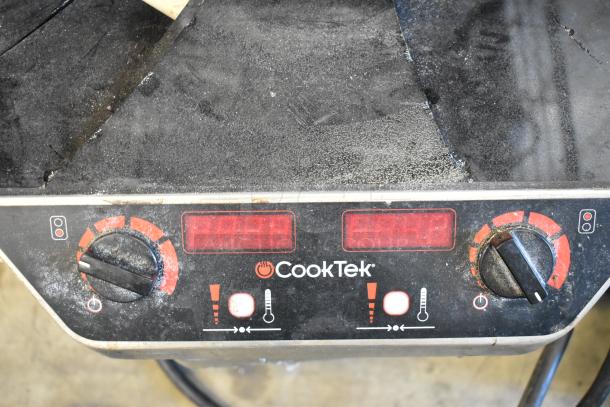 CookTek MC2502F induction range with broken glasstop; features controls, red displays, 200-240 volts. Commercial use.