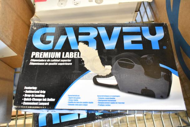2 Garvey G2212-08008 labelers, 1-Line Stock, brand new, scratch and dent, rubberized grip, quick-change ink roller.