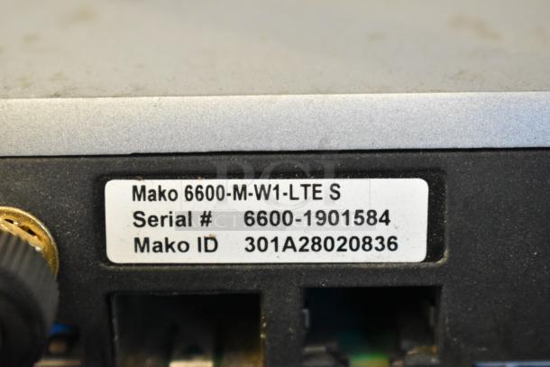 Mako 6600-M-W1-LTE router with visible label showing serial #6600-1901584 and Mako ID 301A28020836.