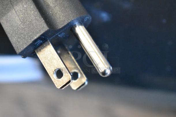 Close-up of a power plug for the AvaMix 928IBHD18 18" Heavy-Duty Variable Speed Immersion Blender, 120 Volts.