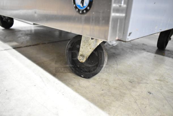 2018 Hoshizaki CRMF48-WD4 stainless steel cooler on commercial casters, 115V, 1 phase, 4-drawer, worktop. Appears in good condition.