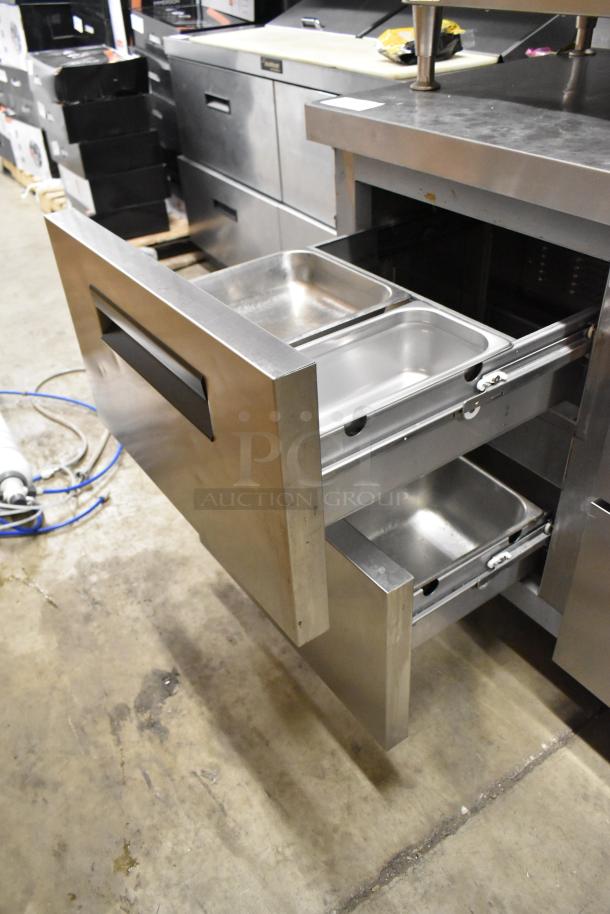 2018 Hoshizaki CRMF48-WD4 stainless steel 4-drawer work top cooler on casters, shown with open drawers, 115V.