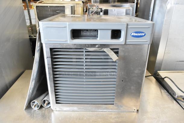 Stainless steel Follett HCD710ABT commercial ice machine, 2019, 759 lb capacity. Visible brand logo, good condition.