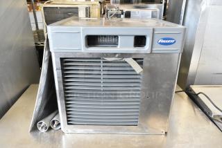 Stainless steel Follett HCD710ABT commercial ice machine, 2019, 759 lb capacity. Visible brand logo, good condition.