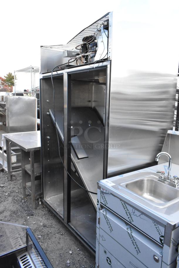 True TR2R-2S commercial cooler, stainless steel, missing door, 115V, 1 phase, visible compressor unit.