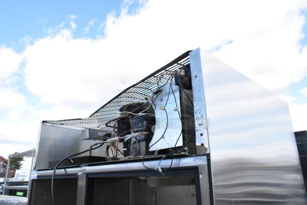 True TR2R-2S reach-in cooler, stainless steel, missing door, 115V, 1 phase. Upper wiring and components visible.