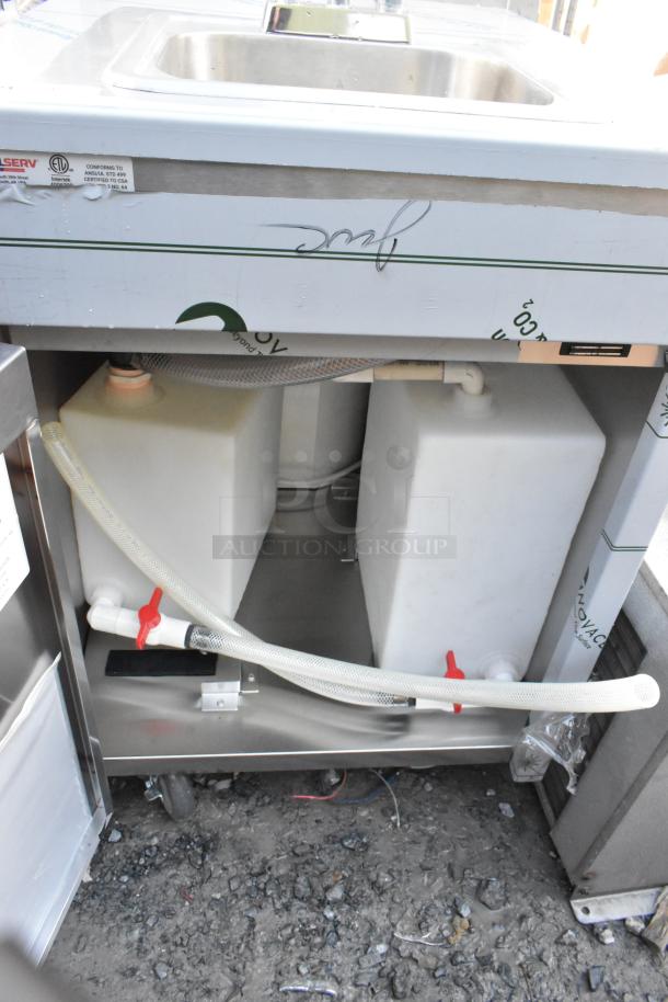 QualServ stainless steel commercial portable sink with commercial casters, brand new with minor scratches. Features water tanks and piping underneath.