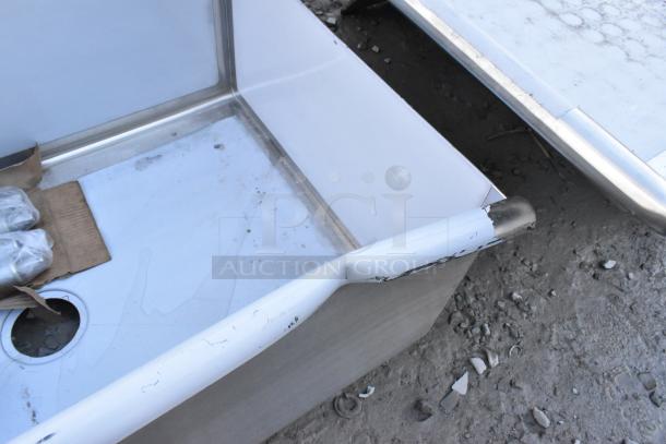 Brand new Regency 600S13624SB utility sink, 36"x24"x13", for 8" center faucet, scratch and dent condition, visible corner wear.