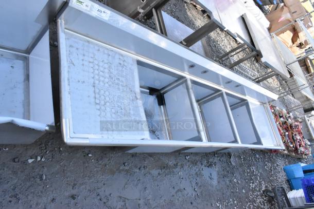 Stainless steel Regency 600S32424224 3 bay sink with dual drain boards, scratch and dent, brand new, no legs.