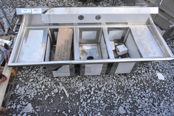 BRAND NEW SCRATCH AND DENT Regency 600S31220212 three-compartment stainless steel sink with galvanized steel legs, 2 drainboards.