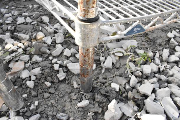 Metro 5-tier chrome wire shelving unit with visible rust, buyer must dismantle. Consider freight charges.