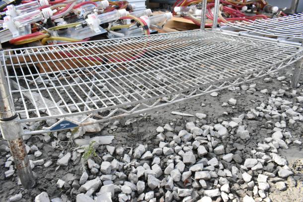 Metro 5-tier chrome wire shelving unit, slightly rusted, Buyer's dismantle required, freight costs apply.