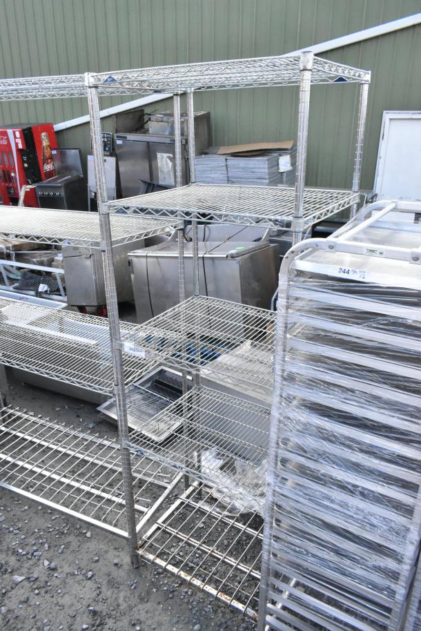 Metro chrome finish 5-tier wire shelving unit; used condition, buyer must dismantle and consider freight charges.