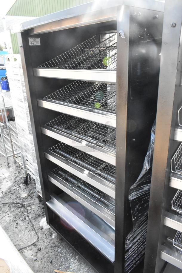 Vulcan 1013776 metal bakery display rack, features multiple angled wire baskets, commercial casters, sturdy steel frame.