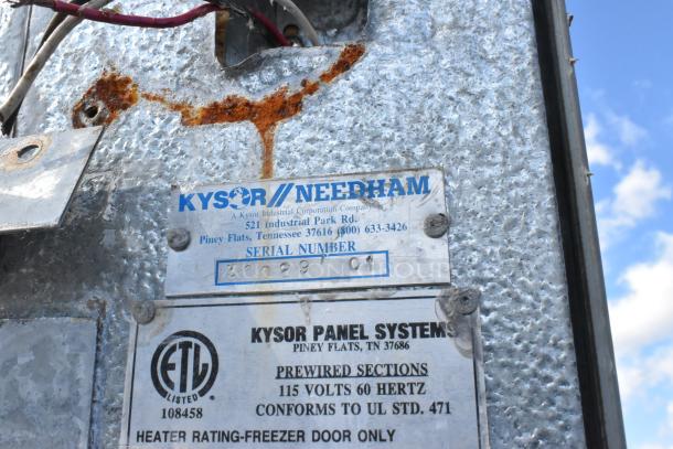 Kysor Walk In Door with frame, serial number plaque visible, labeled for freezer use, some rust on surface.