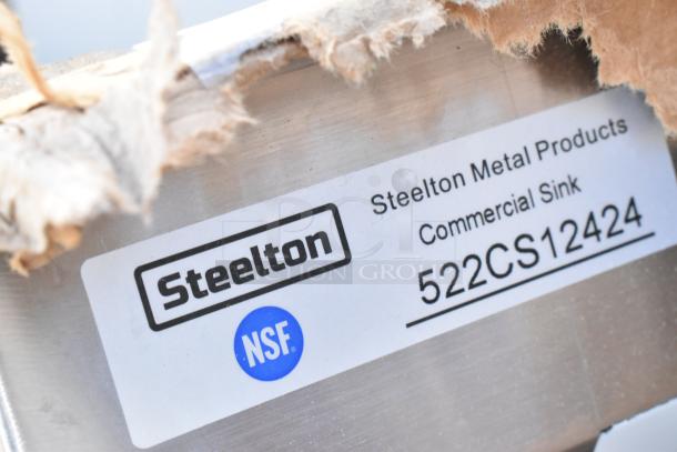 Label showing Steelton Metal Products, Commercial Sink, and model 522CS12424, indicating NSF certification.