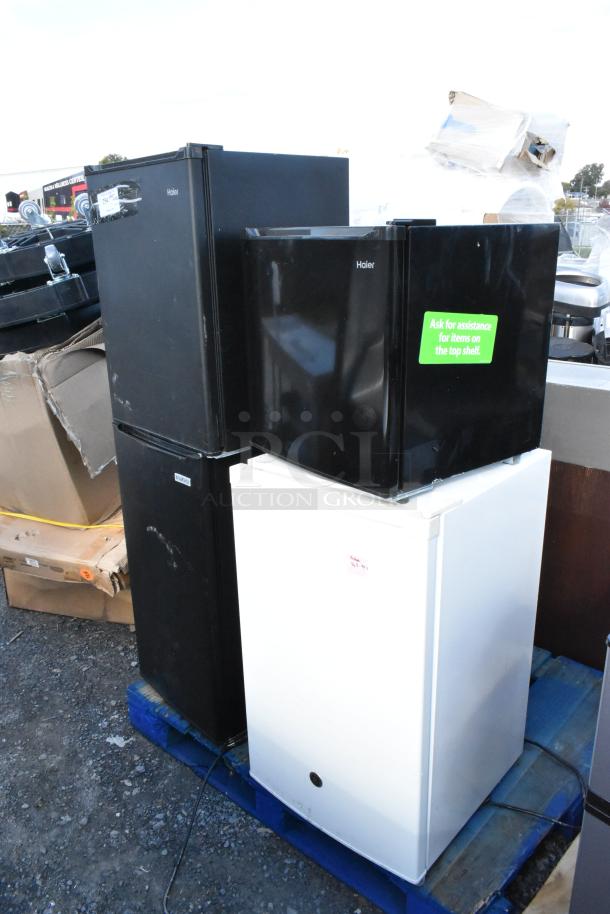 Four mini coolers including Haier HC27SF10RB, Nostalgia IRF32BK, Haier QHE02GGMBBB, GE GME04GGKBWW on a pallet. 115 volts, 1 phase.