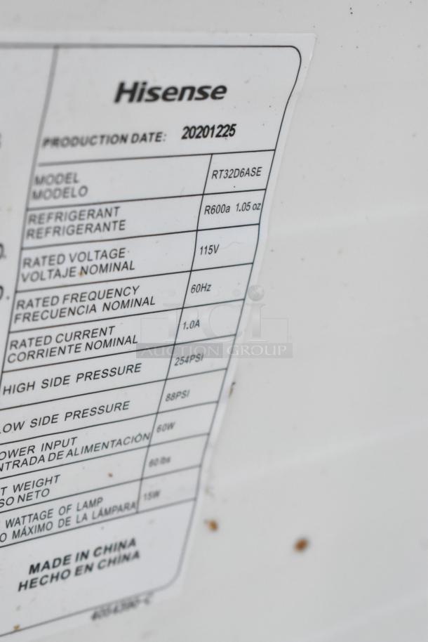 Label on a Hisense mini cooler model RT32D6ASE, shows 115V, 1-phase, R600a refrigerant, 2020 production, made in China.