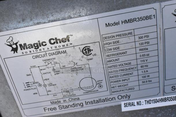 Close-up of Magic Chef model HMBR350BE1 cooler label, showing voltage, refrigerant type R600a, and circuit diagram.