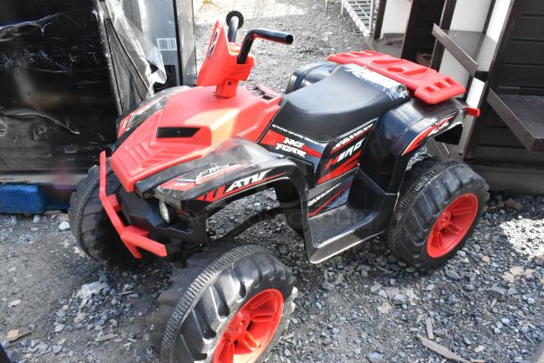 Hero No Fear Childrens ATV, black and red, features bold decals, sturdy build, used condition, ideal for young riders.