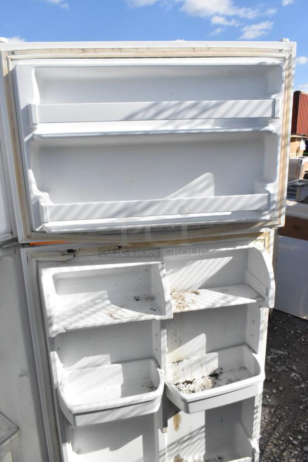 Maytag single door reach-in cooler with freezer, 115 volts, 1 phase, visible dirt, needs cleaning.