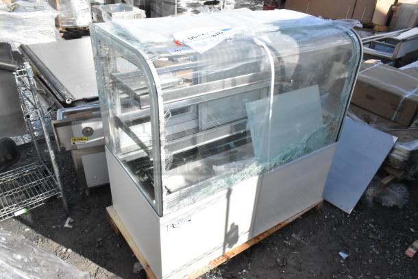 Brand new Avantco 193BC48HCW 48" white refrigerated bakery display case with curved glass; visible glass damage.