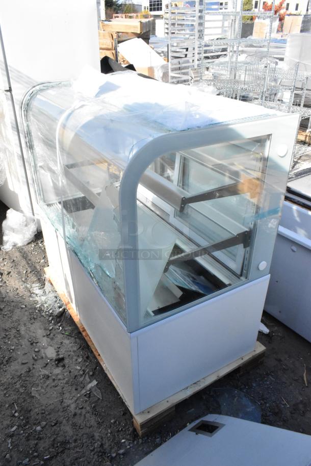 Brand new Avantco 193BC48HCW 48" white refrigerated bakery display case with broken curved glass. 115V, 1 Phase.