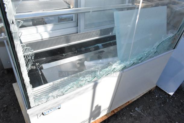 Brand new Avantco 193BC48HCW 48" curved glass refrigerated display case. Visible broken glass. 115V, 1 Phase.