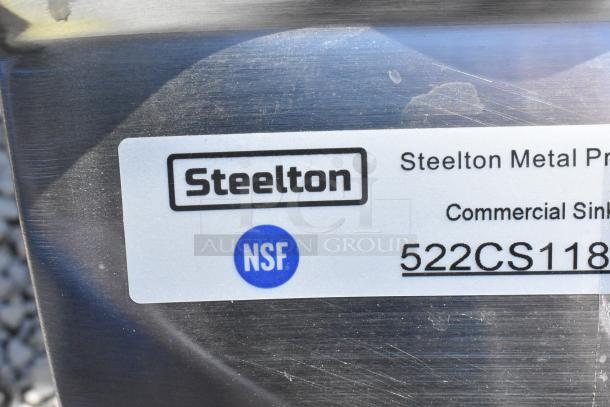 Brand new Steelton 522CS11818N stainless steel single bay sink with scratches, tagged with NSF mark. No legs included.