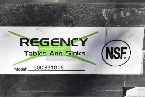 Regency 600S31818 stainless steel 3-bay sink label, featuring NSF certification. 