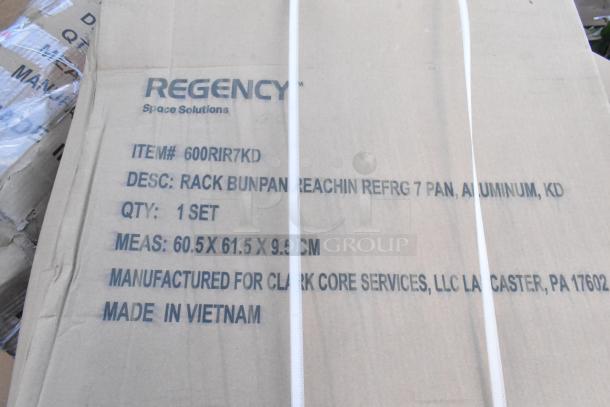 Cardboard box labeled “Regency Rack Bun Pan 600RIR7KD, 7 Pan, Aluminum, KD, Made in Vietnam.”