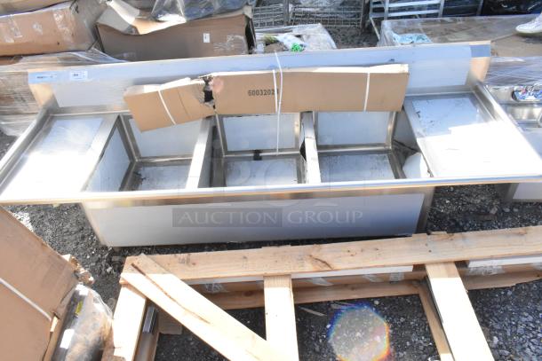 Alt text: Regency Spec Line stainless steel 3 bay sink with dual drain boards, brand new, showing scratch and dent.