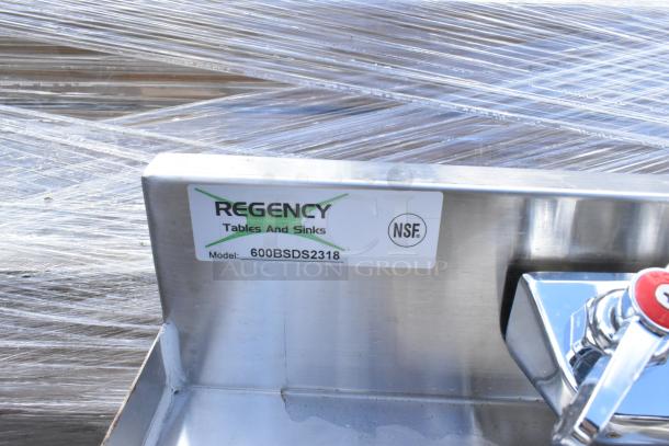 "Brand new Regency 600BSDS2318 stainless steel blender station with dump sink, 18x23 inches, scratch and dent condition, NSF certified."