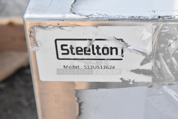 Steelton 522US13624 utility sink with scratches and dents. Dimensions 36"x24"x14". For 8" center faucet. Brand label visible.