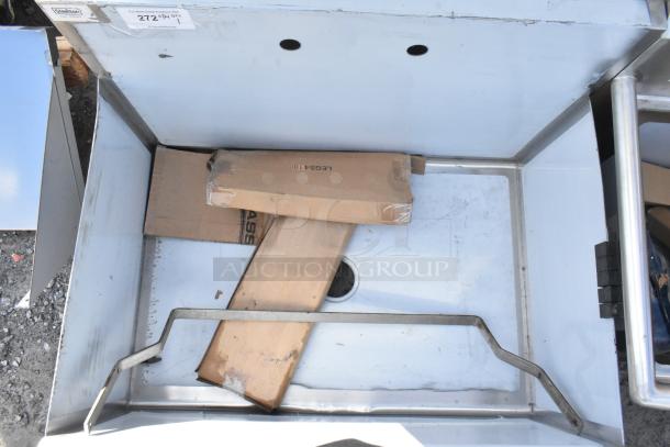 Brand new Steelton 522US13624 36"x24"x14" utility sink with 8" center faucet holes, visible dents and scratch marks.